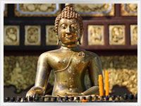 statue of the teaching buddha at a thai temple