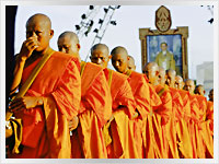 Thai Buddhist monks going to collect alms