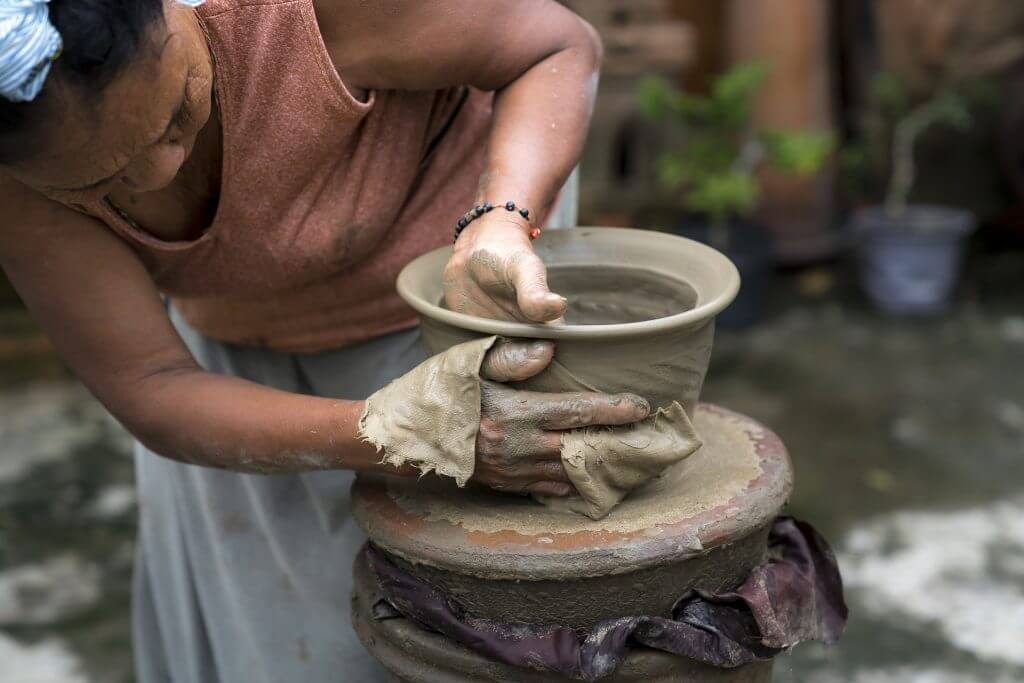 Picture of Asian Lady doing Pottery